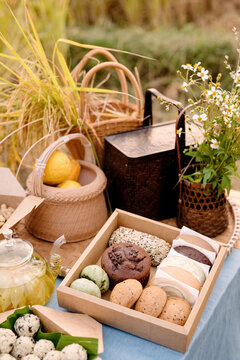 Closeup shots of handmade pastries and rice balls on a country table