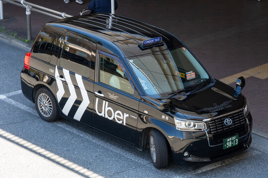 NERIMA, TOKYO, JAPAN - APRIL 8, 2026: A taxi vehicle featuring Uber Taxi branding operates near Nerima Station in the Nerima district of Tokyo.