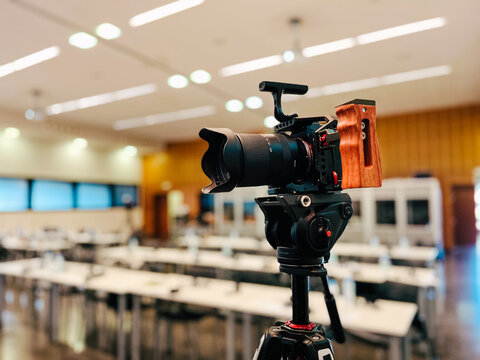 Professional camera rig recording an empty conference hall