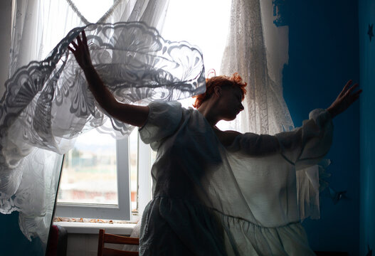 At the window 