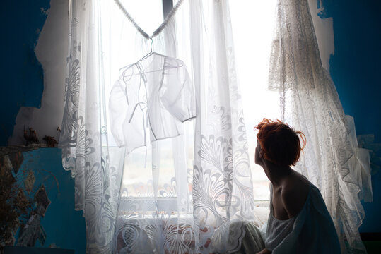 At the window 