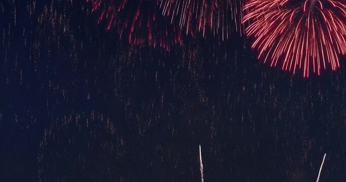 Abstract fireworks display against a dark background