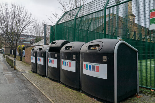 Community Recycle Bins Line the Street near community housing