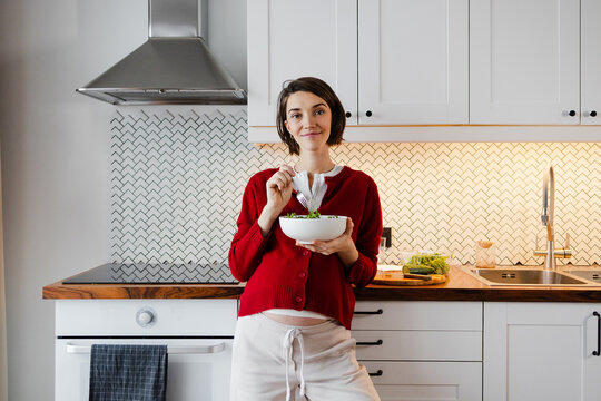 Portrait of pregnant woman at home 