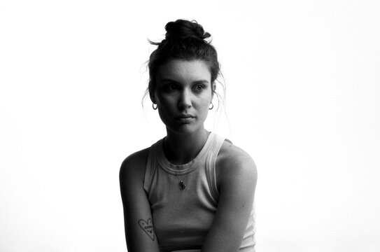 Portrait of a woman Sitting and Looking off to the Side