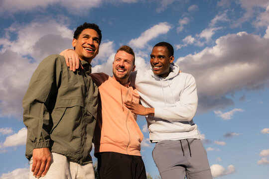 Multiethnic friends sharing a moment outdoors