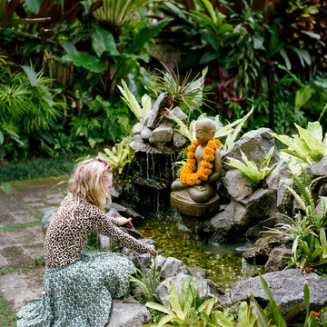 Girl looking at fish