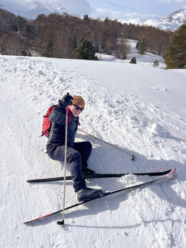 Funny Moment Of Man Fall With Skis in a Snowy Landscape