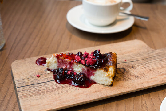Basque Cheesecake Served With Berries and Coffee