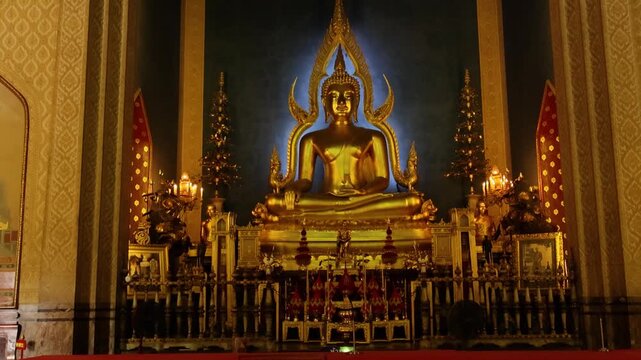Peaceful sacred space with shining idol and intricate design