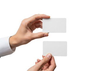 Obraz premium Meticulously manicured caucasian male hand presenting two blank matte white rigid plastic business cards (macro shot, soft studio light, white background). Corporate identity mockup concept