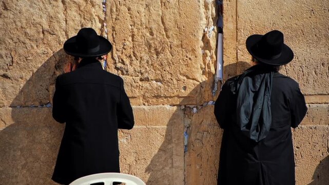 WESTERN WALL IN ISRAEL, PEOPLE PRAYING