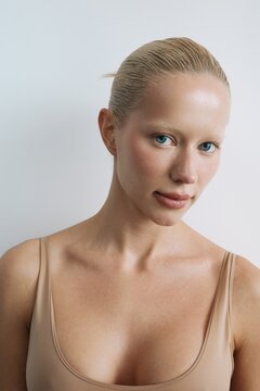 Beauty Portrait of Blonde Woman with Natural Fresh Skin