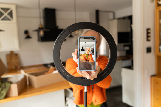 Senior woman live streaming fashion