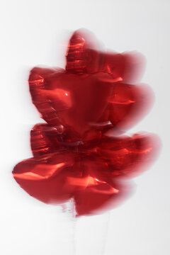 Heart shaped balloons with motion blur