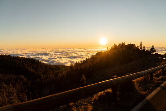 Road sunset sea clouds
