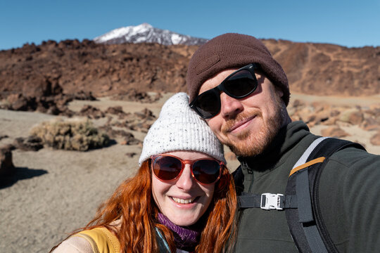 Smiling couple Teide selfie