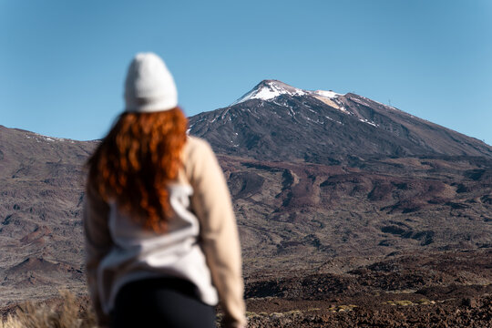 Woman looking Teide volcano