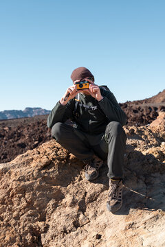 Man taking photo outdoors