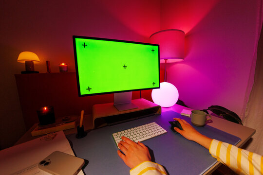 Desktop mockup with green screen in cozy workspace