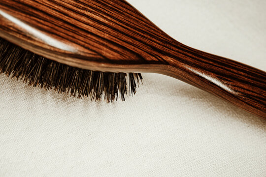 Hair Brush on a Light Surface in a Simple Setting