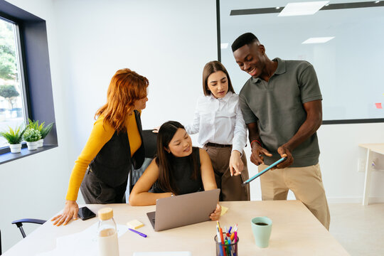 Diverse business team collaborating during office meeting