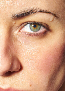 Drops of water in her face