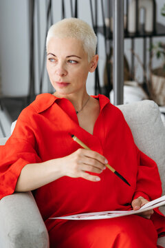 Creative Moment in a Stylish Studio With a Thoughtful Artist