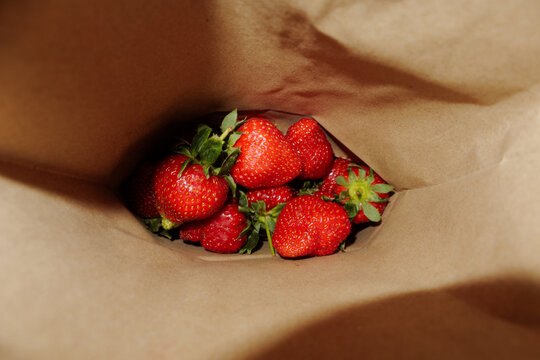 strawberries in a paper bag