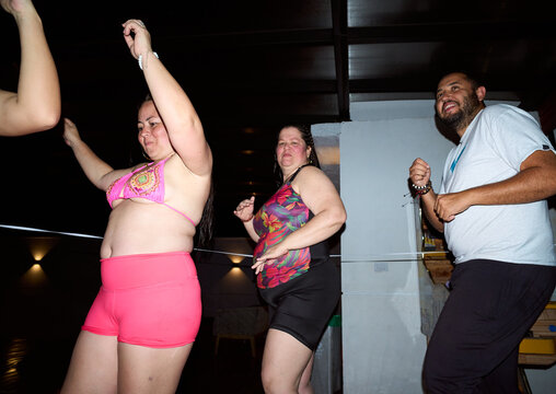 People dancing enjoying a fun night party