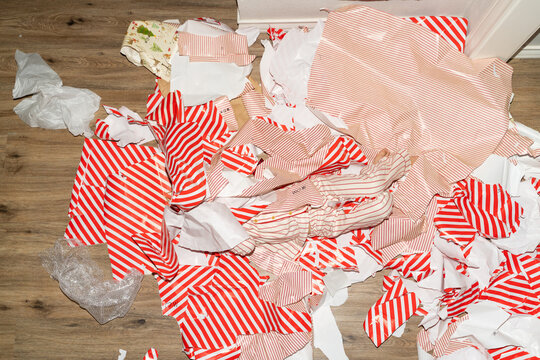 Child In Christmas Wrapping Paper