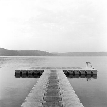 Minimal Pier on Quiet Water