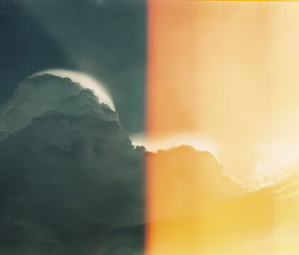 Storm Clouds Split by Film Light Leak