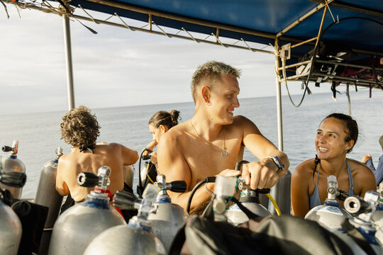 Family Packing Scuba Equipment After Dive Koh Tao, Thailand