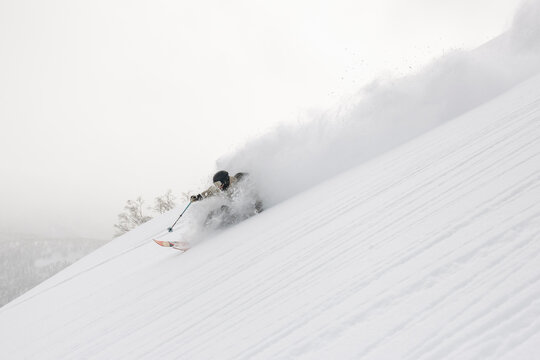 Backcountry skier on deep powder