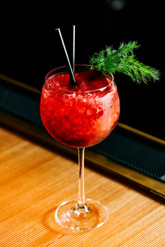Punch Cocktail with a beet slice