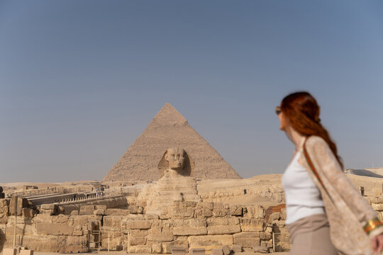 Tourists Visit the Sphinx and Great Pyramid of Giza in Egypt