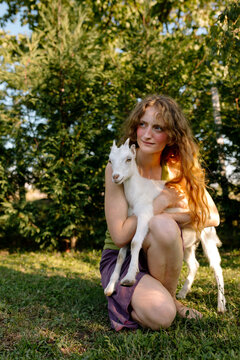 Country girl and her goat