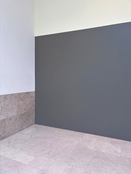 Interior Corner With Gray Wall, and Marble Tiled Floor 