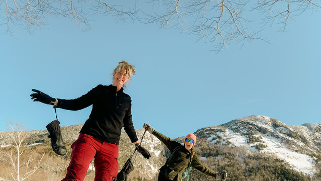 two women excited to go on a hike. 