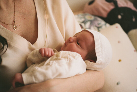 Tender moment between mother and newborn