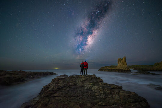 Father and Son under the night sky