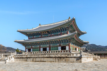 Fototapeta premium Geunjeongjeon Hall, the main throne hall of Gyeongbokgung Palace under a clear blue sky, Seoul, South Korea.(Location): Gyeongbokgung Palace, Seoul, South Korea