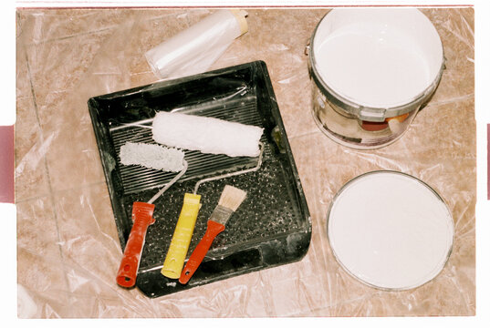 Painting Tools and Supplies on Floor During Renovation