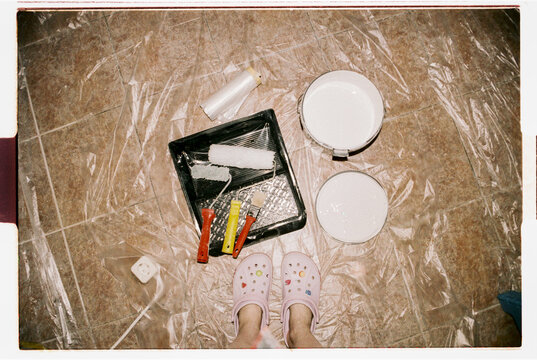 Painting Tools and Supplies on Floor During Renovation