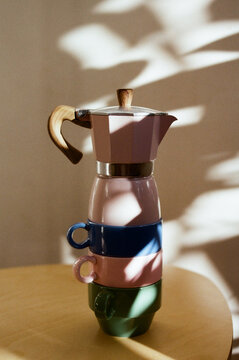 Coffee maker with colorful cups