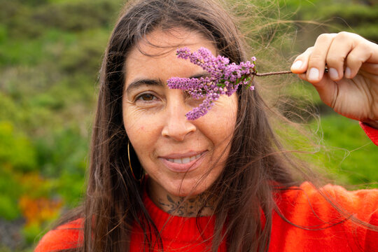 Indigenous woman with flower