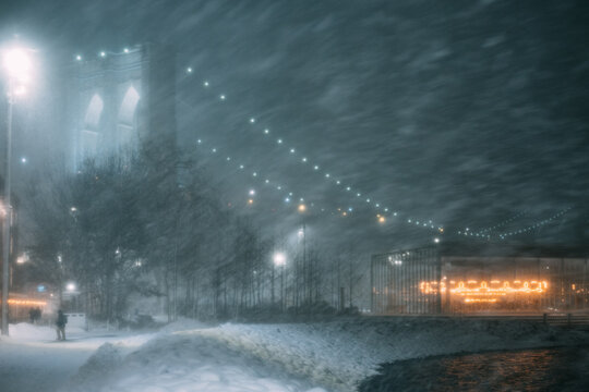 Snowstorm Hits City Streets Near Brooklyn Bridge During Night