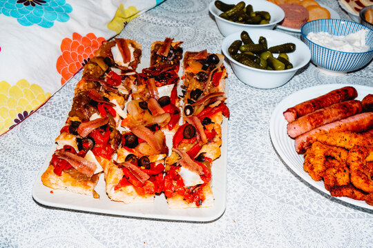 a platter of traditional Catalan coca with tapas