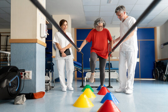 Senior woman undergoing physical therapy for mobility rehabilitation